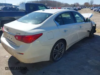 2015 Infiniti Q50 Premium z VIN JN1BV7AR0FM403268, wystawiony jako IAAI lot #41994978 z przebiegiem 125 399 mil mil oraz . Historia ofert i sprzedaży dostępna na DreamBid. Obrazek 4.