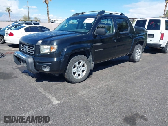 2007 Honda Ridgeline RTL w/Leather with VIN 2HJYK16577H547869, listed as a IAAI auction lot 41939741 with 248,916 mi miles. Bid and sale history available at carsss.com. Image 2.