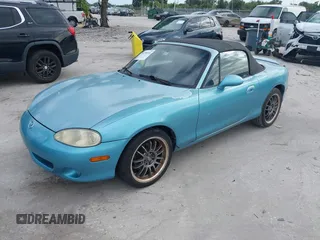 2001 Mazda MX-5 Miata z VIN JM1NB353510208607, wystawiony jako IAAI lot #42780318 z przebiegiem 111 883 mil mil oraz . Historia ofert i sprzedaży dostępna na DreamBid. Obrazek 2.