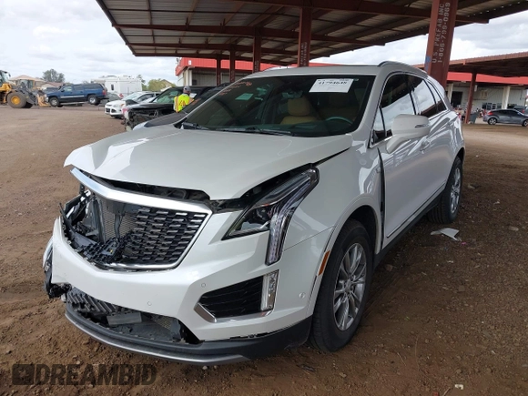 2021 Cadillac XT5 FWD Premium Luxury with VIN 1GYKNCRS5MZ224957, listed as a IAAI auction lot 41794648 with 28,540 mi miles and . Bid and sale history available at carsss.com. Image 17.