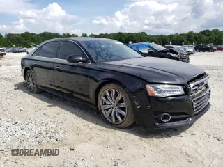 2017 Audi A8 Sport with VIN WAU43AFD3HN007397, listed as a Copart auction lot 54581173 with 77,961 mi miles and Salvage title. Bid and sale history available at DreamBid. Image 4.