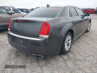 2015 Chrysler 300 Limited with VIN 2C3CCAAG4FH814179, listed as a IAAI auction lot 42058849 with 167,946 mi miles. Bid and sale history available at carsss.com. Image 4.