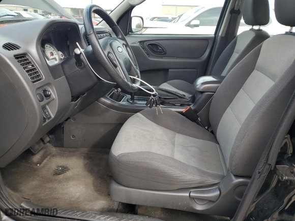 2007 Ford Escape XLS with VIN 1FMYU02Z97KB08307, listed as a Copart auction lot 87320234 with 121,746 mi miles and Salvage Title. Bid and sale history available at carsss.com. Image 7.