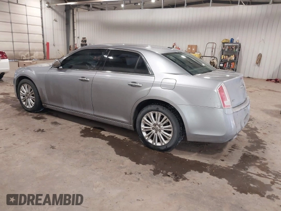 2013 Chrysler 300 with VIN 2C3CCAKT6DH645307, listed as a IAAI auction lot 41512163 with 154,225 mi miles. Bid and sale history available at carsss.com. Image 3.