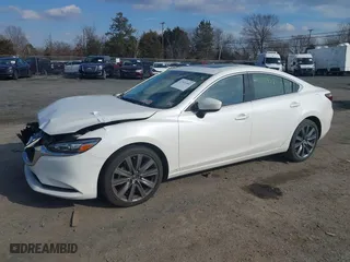 2021 Mazda Mazda6 Touring with VIN JM1GL1VM8M1615516, listed as a IAAI auction lot 41531402 with 59,585 mi miles. Bid and sale history available at carsss.com. Image 17.