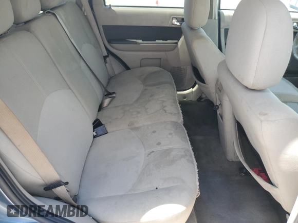 2010 Mercury Mariner with VIN 4M2CN9B70AKJ08597, listed as a Copart auction lot 63486595 with 113,207 mi miles and Salvage title. Bid and sale history available at DreamBid. Image 11.