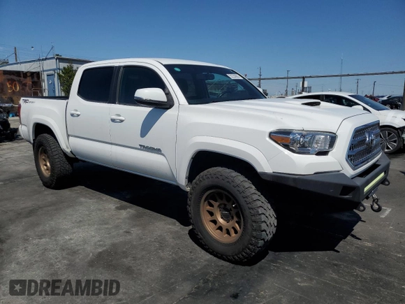 2017 Toyota Tacoma SR5 with VIN 3TMAZ5CNXHM041159, listed as a Copart auction lot 52250905 with 99,337 mi miles and Salvage Title. Bid and sale history available at DreamBid. Image 4.