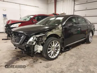 2014 Cadillac XTS Platinum with VIN 2G61W5S88E9186969, listed as a IAAI auction lot 41422872 with 184,998 mi miles and . Bid and sale history available at DreamBid. Image 2.