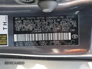 2022 Toyota Prius L Eco z VIN JTDKAMFU1N3157291, wystawiony jako Copart lot #58756485 z przebiegiem 69 737 mil mil oraz Szkoda całkowita • Salvage title. Historia ofert i sprzedaży dostępna na DreamBid. Obrazek 12.