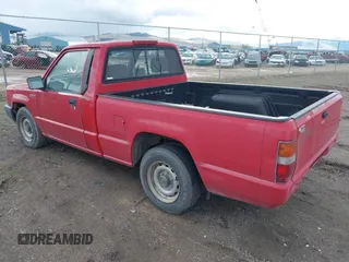1994 Mitsubishi Mighty Max z VIN JA7LS21G0RP007773, wystawiony jako IAAI lot #41915117 z przebiegiem 68 410 mil mil oraz . Historia ofert i sprzedaży dostępna na DreamBid. Obrazek 3.