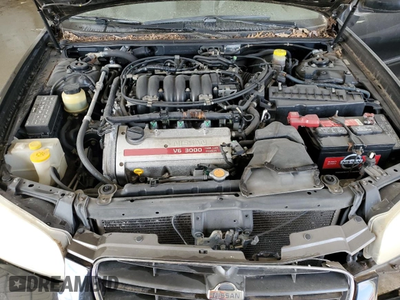 2000 Nissan Maxima GXE z VIN JN1CA31A1YT211725, wystawiony jako Copart lot #47401895 z przebiegiem 122 228 mil mil oraz Szkoda całkowita • Salvage title. Historia ofert i sprzedaży dostępna na DreamBid. Obrazek 11.