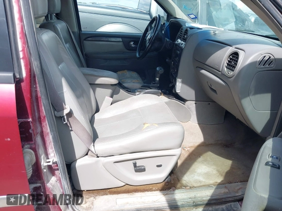 2006 GMC Envoy SLE z VIN 1GKDS13S362314323, wystawiony jako IAAI lot #42476958 z przebiegiem 164 322 mil mil oraz . Historia ofert i sprzedaży dostępna na DreamBid. Obrazek 5.