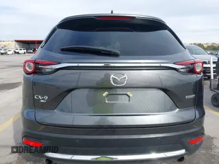 2023 Mazda CX-9 Grand Touring z VIN JM3TCBDY0P0631395, wystawiony jako IAAI lot #41449555 z przebiegiem 17 721 mil mil oraz . Historia ofert i sprzedaży dostępna na DreamBid. Obrazek 16.