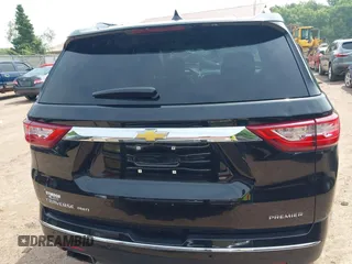 2019 Chevrolet Traverse Premier with VIN 1GNEVKKW1KJ282531, listed as a IAAI auction lot 42408361 with 95,464 mi miles and . Bid and sale history available at DreamBid. Image 16.