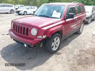 2014 Jeep Patriot Sport with VIN 1C4NJPBBXED617934, listed as a IAAI auction lot 42001839 with 117,306 mi miles. Bid and sale history available at carsss.com. Image 2.