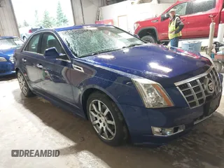 2012 Cadillac CTS Luxury z VIN 1G6DG5E5XC0125819, wystawiony jako IAAI lot #42251305 z przebiegiem 233 887 mil mil oraz . Historia ofert i sprzedaży dostępna na DreamBid. Obrazek 1.