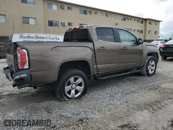 2015 GMC Canyon 4WD SLE with VIN 1GTG6BE38F1263139, listed as a Copart auction lot 75479854 with 124,765 mi miles and Salvage Title. Bid and sale history available at carsss.com. Image 3.