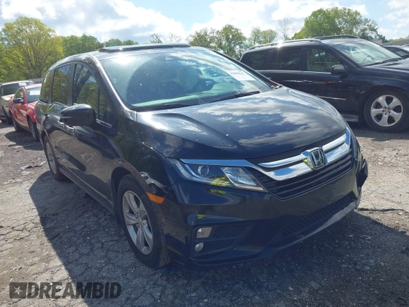 2018 Honda Odyssey EX-L with VIN 5FNRL6H75JB065206, listed as a IAAI auction lot 42009227 with 133,652 mi miles. Bid and sale history available at carsss.com. Image 1.