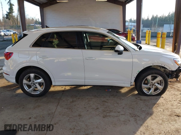 2021 Audi Q3 Premium with VIN WA1AUCF37M1087692, listed as a IAAI auction lot 41277380 with 66,039 mi miles and . Bid and sale history available at DreamBid. Image 14.