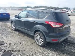 2014 Ford Escape SE with VIN 1FMCU0G9XEUE35271, listed as a IAAI auction lot 40896477 with 139,444 mi miles. Bid and sale history available at carsss.com. Image 3.