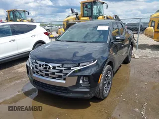 2022 Hyundai Santa Cruz SEL with VIN 5NTJBDAE2NH008015, listed as a IAAI auction lot 42232891 with 31,450 mi miles and . Bid and sale history available at DreamBid. Image 2.