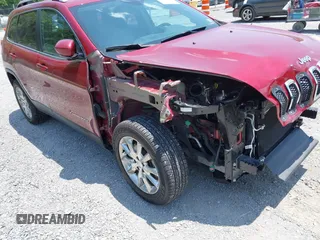 2016 Jeep Cherokee Limited with VIN 1C4PJMDB3GW267073, listed as a IAAI auction lot 42457201 with 84,325 mi miles and . Bid and sale history available at DreamBid. Image 18.
