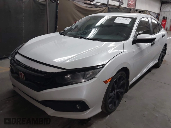 2019 Honda Civic Sport with VIN 19XFC2F86KE022749, listed as a IAAI auction lot 42127993 with 116,279 mi miles and . Bid and sale history available at DreamBid. Image 17.