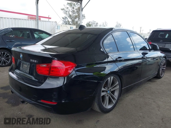 2014 BMW 3 Series 328i with VIN WBA3C1G53ENR49917, listed as a IAAI auction lot 42116704 with 148,630 mi miles and . Bid and sale history available at carsss.com. Image 4.