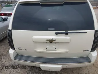 2009 Chevrolet Tahoe LTZ z VIN 1GNFK33089R218771, wystawiony jako IAAI lot #41789581 z przebiegiem 209 247 mil mil oraz . Historia ofert i sprzedaży dostępna na DreamBid. Obrazek 17.