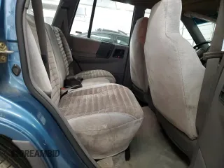 1994 Jeep Grand Cherokee Laredo with VIN 1J4FX58S0RC316030, listed as a Copart auction lot 66178754 with 281,785 mi miles and Salvage Title. Bid and sale history available at carsss.com. Image 11.