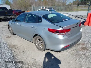 2018 Kia Optima LX with VIN 5XXGT4L34JG199623, listed as a IAAI auction lot 41712608 with 153,315 mi miles and . Bid and sale history available at DreamBid. Image 3.