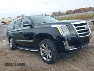 2019 Cadillac Escalade Luxury z VIN 1GYS4BKJ1KR398505, wystawiony jako IAAI lot #40662422 z przebiegiem 57 932 mil mil oraz . Historia ofert i sprzedaży dostępna na DreamBid. Obrazek 1.