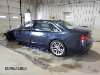 2016 Audi A8 Sport с VIN WAU43AFDXGN004897, выставлен на аукционе Copart как лот 63614425 с пробегом Не указан миль и Списание • Salvage title. История ставок и продаж доступна на DreamBid. Изображение 2.