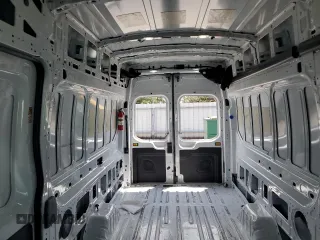 2023 Ford Transit Cargo with VIN 1FTBR3X84PKA19922, listed as a Copart auction lot 67894664 with 137,945 mi miles and Clean Title. Bid and sale history available at DreamBid. Image 10.