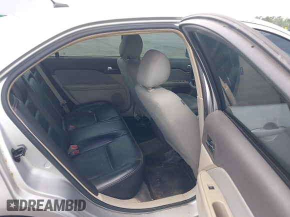 2012 Ford Fusion S with VIN 3FAHP0GAXCR270957, listed as a IAAI auction lot 42122294 with 230,489 mi miles and . Bid and sale history available at carsss.com. Image 8.