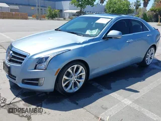 2013 Cadillac ATS Premium with VIN 1G6AE5S31D0152694, listed as a IAAI auction lot 42127294 with 71,882 mi miles. Bid and sale history available at carsss.com. Image 2.