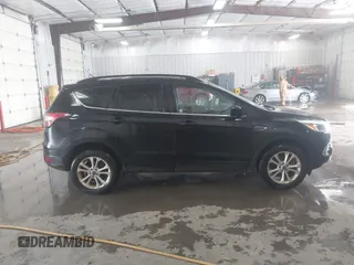 2018 Ford Escape SE with VIN 1FMCU0G99JUC89312, listed as a IAAI auction lot 41484138 with 149,739 mi miles. Bid and sale history available at carsss.com. Image 13.
