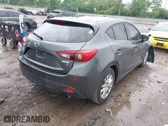 2014 Mazda 3 i Touring z VIN JM1BM1L70E1212930, wystawiony jako IAAI lot #42434348 z przebiegiem 107 209 mil mil oraz . Historia ofert i sprzedaży dostępna na DreamBid. Obrazek 4.
