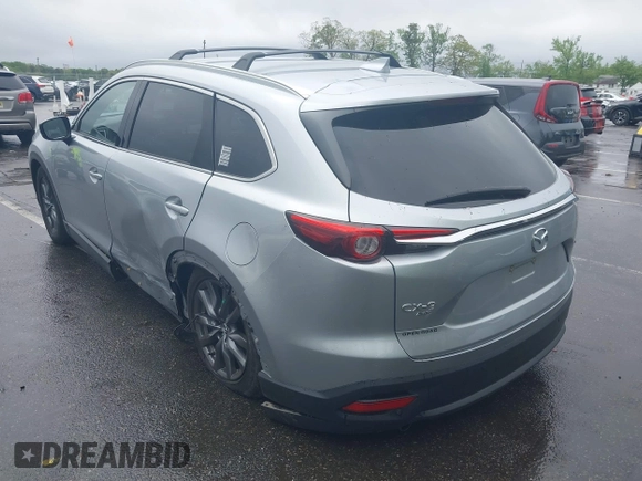 2020 Mazda CX-9 Touring with VIN JM3TCBCY8L0400787, listed as a IAAI auction lot 42188981 with 86,459 mi miles and . Bid and sale history available at DreamBid. Image 3.
