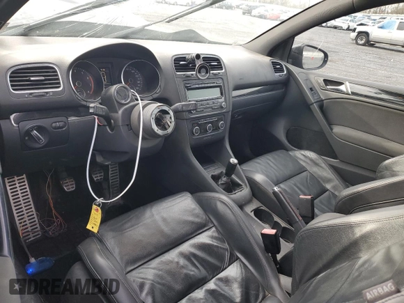 2012 Volkswagen GTI w/Conv & Sunroof with VIN WVWEV7AJ5CW263299, listed as a Copart auction lot 82613574 with 121,505 mi miles and Salvage title. Bid and sale history available at DreamBid. Image 8.