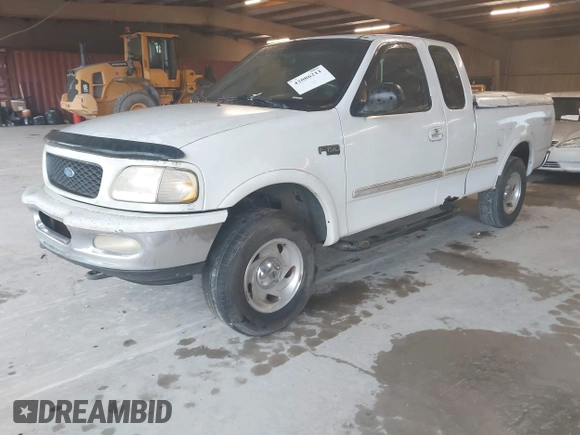 1997 Ford F-150 XL with VIN 1FTDX1861VNA65140, listed as a IAAI auction lot 42086211 with 412,065 mi miles. Bid and sale history available at carsss.com. Image 2.