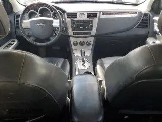2010 Chrysler Sebring Limited with VIN 1C3CC5FB2AN143213, listed as a Copart auction lot 47749715 with 174,850 mi miles and Salvage Title. Bid and sale history available at DreamBid. Image 8.