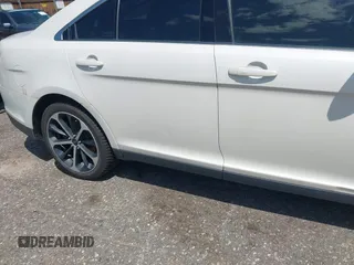 2015 Ford Taurus SEL with VIN 1FAHP2H8XFG203309, listed as a IAAI auction lot 42598215 with 163,190 mi miles and . Bid and sale history available at DreamBid. Image 6.