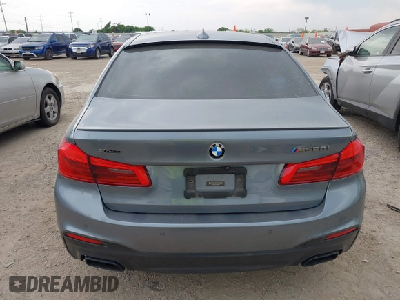 2018 BMW 5 Series M550i xDrive with VIN WBAJB9C55JB035694, listed as a IAAI auction lot 42122730 with 61,561 mi miles and . Bid and sale history available at DreamBid. Image 17.