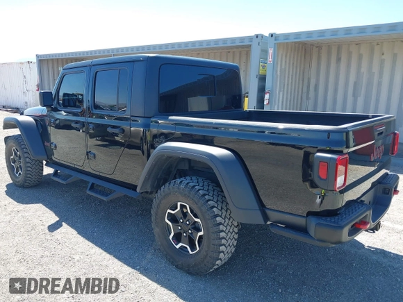 2023 Jeep Gladiator Rubicon z VIN 1C6JJTBG3PL531982, wystawiony jako IAAI lot #42211139 z przebiegiem 28 301 mil mil oraz . Historia ofert i sprzedaży dostępna na DreamBid. Obrazek 3.