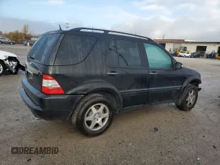 2005 Mercedes-Benz M-Class 5.0L with VIN 4JGAB75E55A542350, listed as a Copart auction lot 79422774 with 169,970 mi miles and Salvage Title. Bid and sale history available at carsss.com. Image 3.