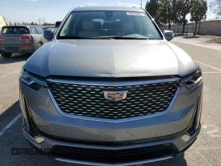 2023 Cadillac XT6 FWD Premium Luxury z VIN 1GYKPCRS5PZ212337, wystawiony jako Copart lot #46283655 z przebiegiem 15 660 mil mil oraz Szkody całkowita. Historia ofert i sprzedaży dostępna na DreamBid. Obrazek 5.