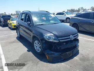 2015 Volkswagen Tiguan SE with VIN WVGAV7AX8FW542393, listed as a IAAI auction lot 42631986 with 132,168 mi miles and . Bid and sale history available at DreamBid. Image 1.
