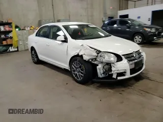 2010 Volkswagen Jetta S with VIN 3VWJZ7AJ5AM004163, listed as a Copart auction lot 54312695 with 148,160 mi miles and Salvage title. Bid and sale history available at DreamBid. Image 13.