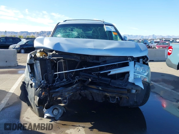 2013 Chevrolet Tahoe LT with VIN 1GNSKBE01DR157083, listed as a IAAI auction lot 41759189 with 153,403 mi miles and . Bid and sale history available at DreamBid. Image 13.